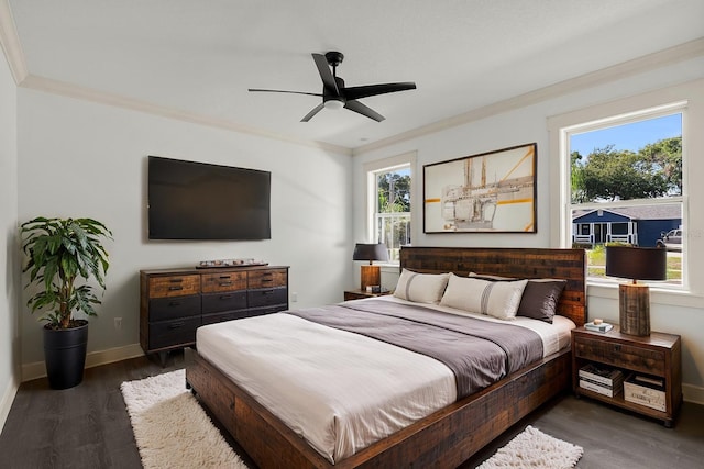 5709 N 20th St, Tampa, FL 33610 - bedroom with ornamental molding, wood finished floors, and a ceiling fan