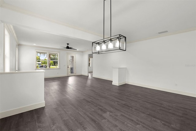 5709 N 20th St, Tampa, FL 33610 - unfurnished living room featuring crown molding, dark wood finished floors, and ceiling fan