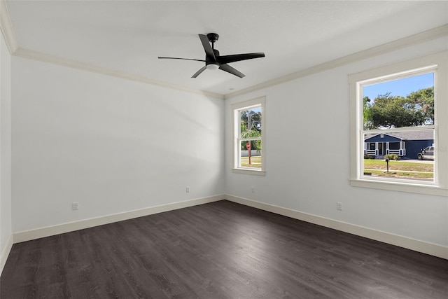 5709 N 20th St, Tampa, FL 33610 - spare room featuring plenty of natural light, ornamental molding, dark wood-style floors, and ceiling fan