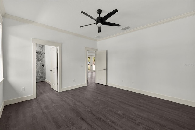 5709 N 20th St, Tampa, FL 33610 - unfurnished bedroom featuring ornamental molding, dark wood-style floors, and ceiling fan