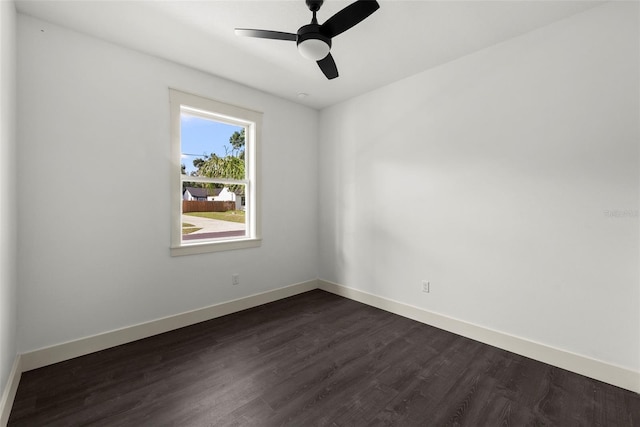 5709 N 20th St, Tampa, FL 33610 - unfurnished room featuring dark wood-style flooring and ceiling fan