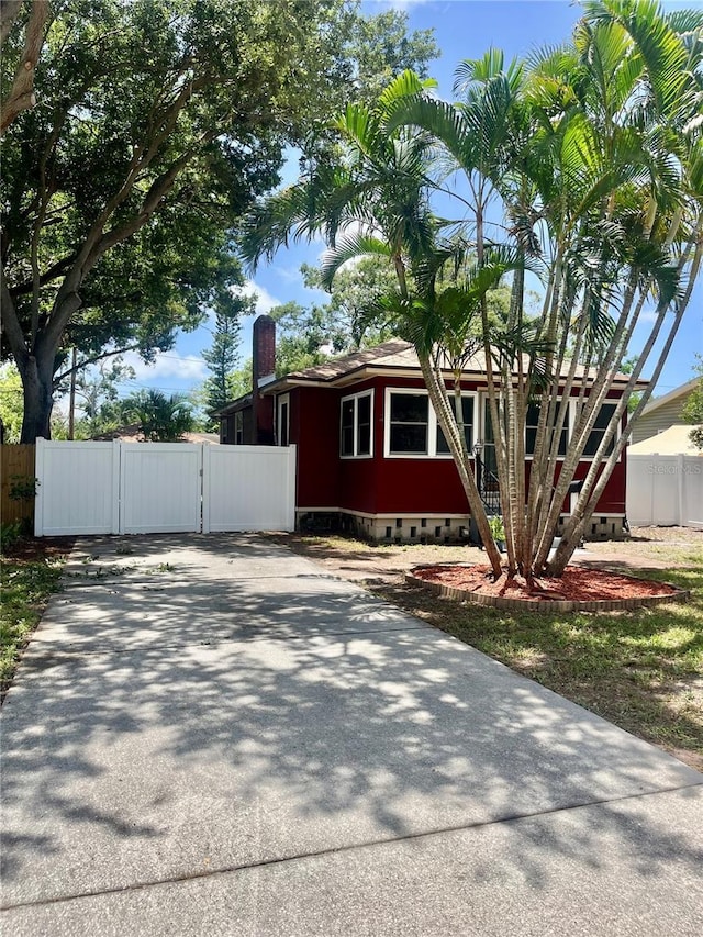 4634 Iris St N, Saint Petersburg, FL 33714 - view of front of property featuring a gate and crawl space