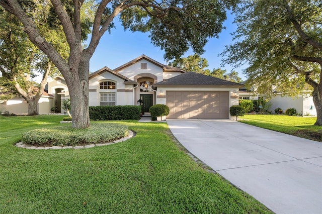 2043 Wrangler Dr, Brandon, FL 33511 - ranch-style home with a garage, stucco siding, driveway, and a front lawn