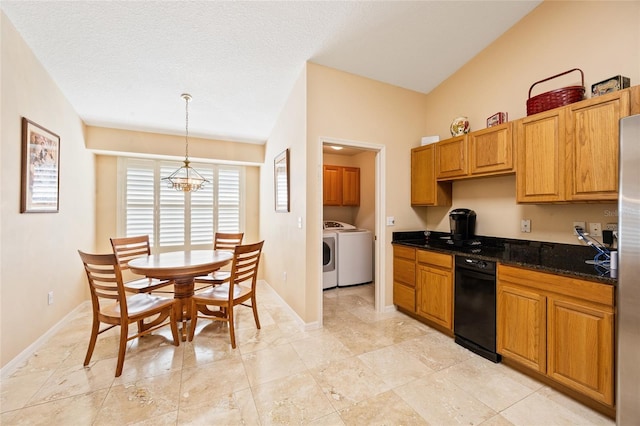 2043 Wrangler Dr, Brandon, FL 33511 - kitchen with washer and clothes dryer, a chandelier, baseboards, decorative light fixtures, and dark stone countertops