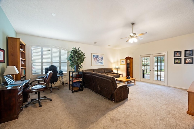 2043 Wrangler Dr, Brandon, FL 33511 - living area featuring light colored carpet, a desk, ceiling fan, and french doors