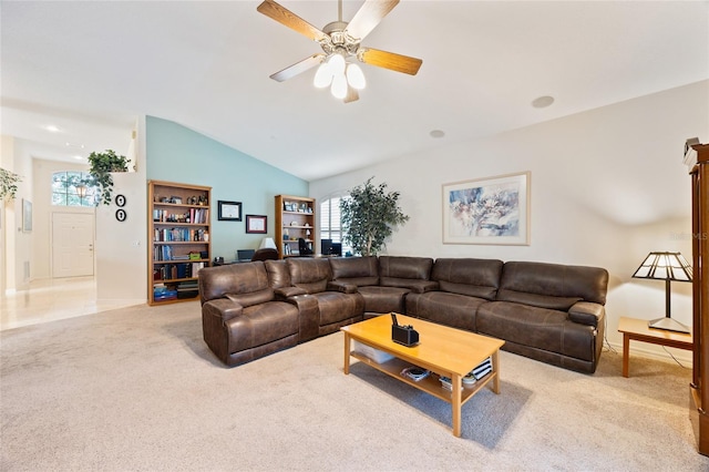 2043 Wrangler Dr, Brandon, FL 33511 - living area with light carpet, vaulted ceiling, and ceiling fan