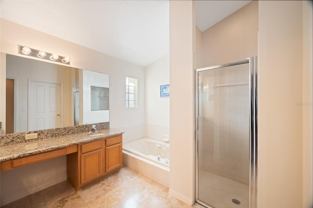 2043 Wrangler Dr, Brandon, FL 33511 - bathroom with a garden tub, vanity, a stall shower, tile patterned flooring, and lofted ceiling