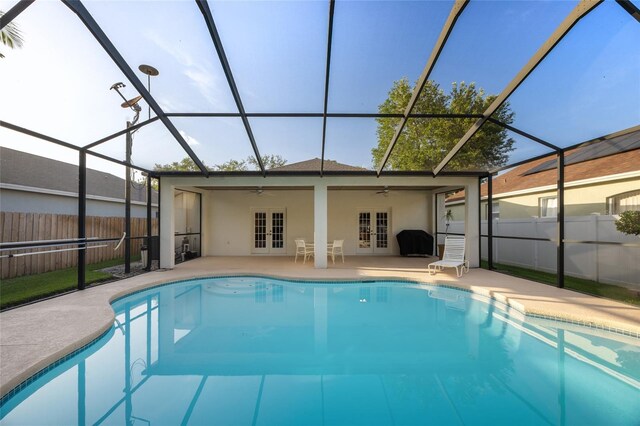 2043 Wrangler Dr, Brandon, FL 33511 - view of pool featuring french doors, a ceiling fan, a patio area, and a lanai