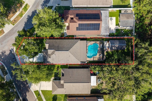 2043 Wrangler Dr, Brandon, FL 33511 - aerial view of property and surrounding area featuring a pool and property boundaries highlighted