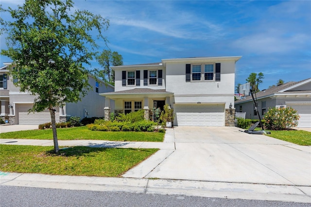 8423 Praise Dr, Tampa, FL 33625 - view of front of house featuring stucco siding, an attached garage, a front lawn, concrete driveway, and stone siding
