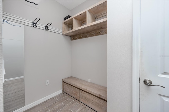 8423 Praise Dr, Tampa, FL 33625 - mudroom with wood tiled floors and baseboards