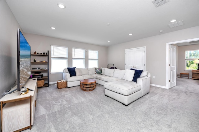 8423 Praise Dr, Tampa, FL 33625 - living area featuring carpet floors, baseboards, and recessed lighting