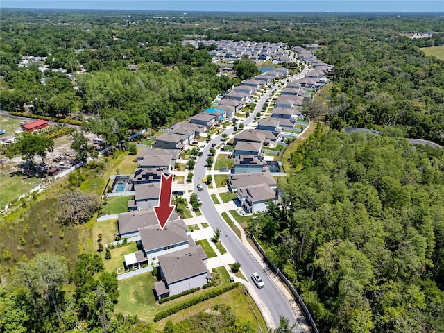 8423 Praise Dr, Tampa, FL 33625 - aerial overview of property's location featuring a heavily wooded area and nearby suburban area