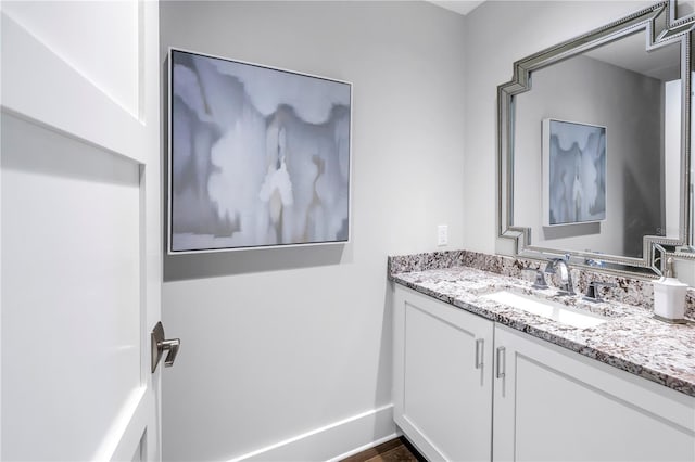 125 Belleview Blvd Unit 203, Belleair, FL 33756 - bathroom featuring vanity and baseboards