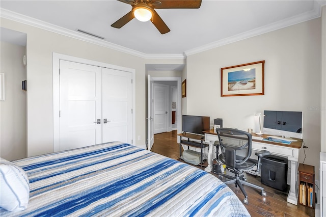 125 Belleview Blvd Unit 203, Belleair, FL 33756 - bedroom featuring wood finished floors, crown molding, a closet, a desk, and ceiling fan
