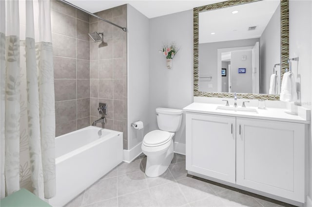125 Belleview Blvd Unit 203, Belleair, FL 33756 - bathroom with shower / bath combo with shower curtain, vanity, and tile patterned floors