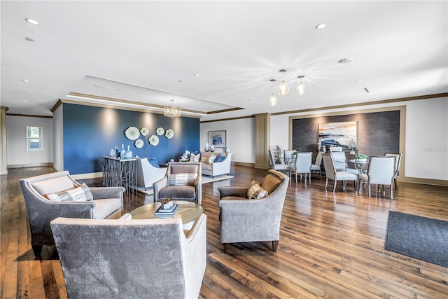 125 Belleview Blvd Unit 203, Belleair, FL 33756 - living room featuring crown molding, recessed lighting, hardwood / wood-style flooring, and a chandelier