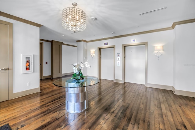 125 Belleview Blvd Unit 203, Belleair, FL 33756 - entryway with elevator, ornamental molding, hardwood / wood-style floors, a chandelier, and recessed lighting