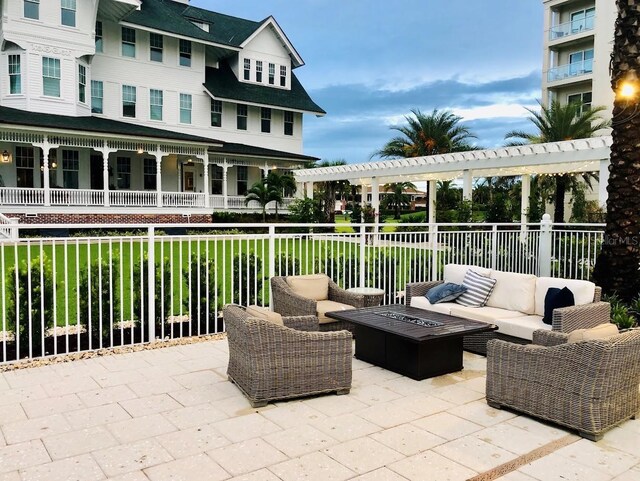 125 Belleview Blvd Unit 203, Belleair, FL 33756 - view of patio with an outdoor living space and a pergola