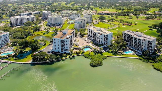 125 Belleview Blvd Unit 203, Belleair, FL 33756 - drone / aerial view of a nearby body of water and a pool area