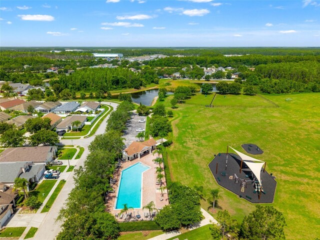 17342 Lawn Orchid Loop, Land O Lakes, FL 34638 - drone / aerial view of a pool area and a nearby body of water