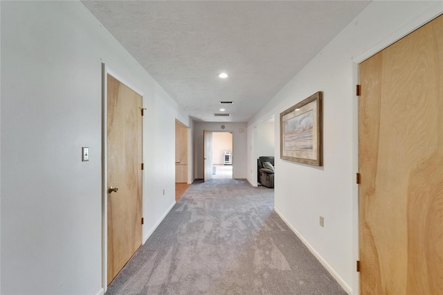1414 75th St NW, Bradenton, FL 34209 - corridor with carpet floors and recessed lighting
