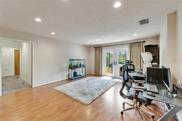 1414 75th St NW, Bradenton, FL 34209 - home office featuring french doors, wood finished floors, and recessed lighting