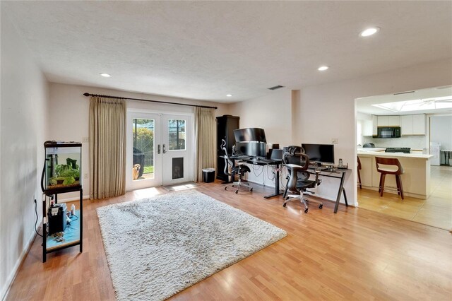 1414 75th St NW, Bradenton, FL 34209 - home office featuring french doors, light wood-type flooring, and recessed lighting