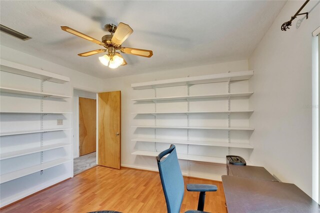 1414 75th St NW, Bradenton, FL 34209 - unfurnished office featuring light wood-style floors and a ceiling fan