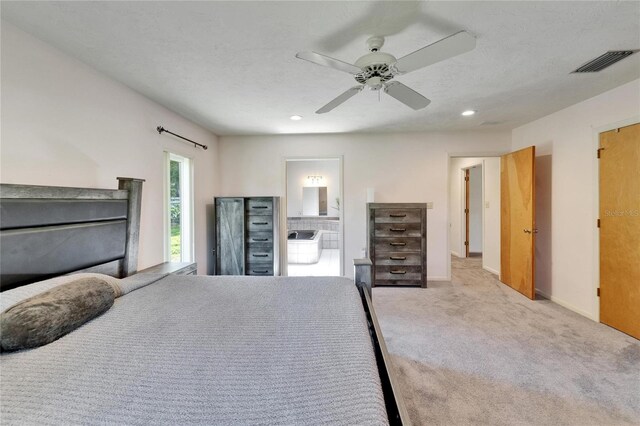 1414 75th St NW, Bradenton, FL 34209 - bedroom featuring carpet flooring, recessed lighting, a ceiling fan, and ensuite bath
