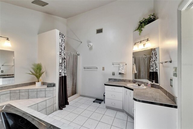 1414 75th St NW, Bradenton, FL 34209 - full bathroom with a shower with shower curtain, vanity, and tile patterned flooring