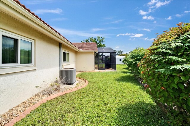 1414 75th St NW, Bradenton, FL 34209 - view of green lawn featuring a lanai