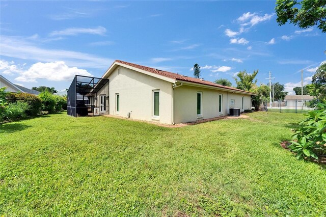 1414 75th St NW, Bradenton, FL 34209 - back of property featuring stucco siding and a lanai