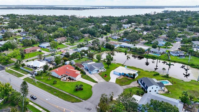 1414 75th St NW, Bradenton, FL 34209 - aerial overview of property's location with a large body of water and nearby suburban area