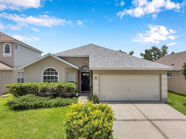 899 Addison Dr NE, Saint Petersburg, FL 33716 - single story home featuring roof with shingles, driveway, stucco siding, and an attached garage