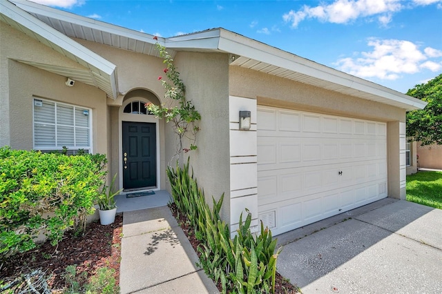 899 Addison Dr NE, Saint Petersburg, FL 33716 - property entrance featuring stucco siding