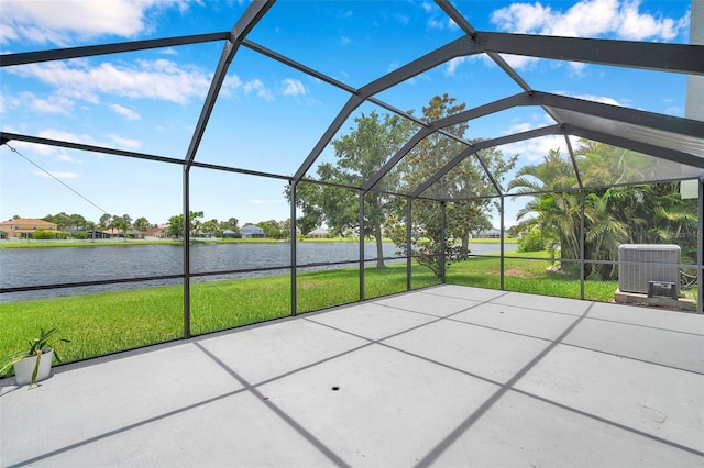 899 Addison Dr NE, Saint Petersburg, FL 33716 - view of patio featuring a water view and glass enclosure