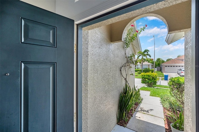 899 Addison Dr NE, Saint Petersburg, FL 33716 - property entrance with stucco siding