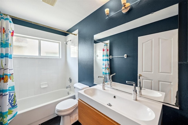 899 Addison Dr NE, Saint Petersburg, FL 33716 - full bathroom with shower / tub combo with curtain, vanity, and a textured wall