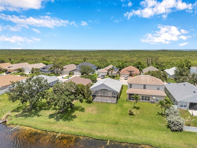899 Addison Dr NE, Saint Petersburg, FL 33716 - aerial view of residential area with a nearby body of water and a forest