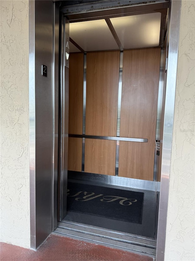 19451 Gulf Blvd Unit 205, Indian Shores, FL 33785 - elevator featuring a textured wall