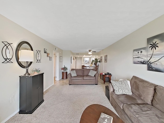 19451 Gulf Blvd Unit 205, Indian Shores, FL 33785 - living area featuring light colored carpet and a ceiling fan