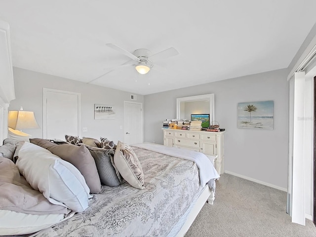 19451 Gulf Blvd Unit 205, Indian Shores, FL 33785 - bedroom featuring light carpet and a ceiling fan