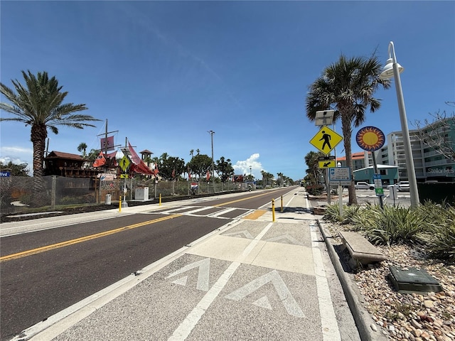 19451 Gulf Blvd Unit 205, Indian Shores, FL 33785 - view of asphalt road featuring sidewalks, curbs, and street lighting