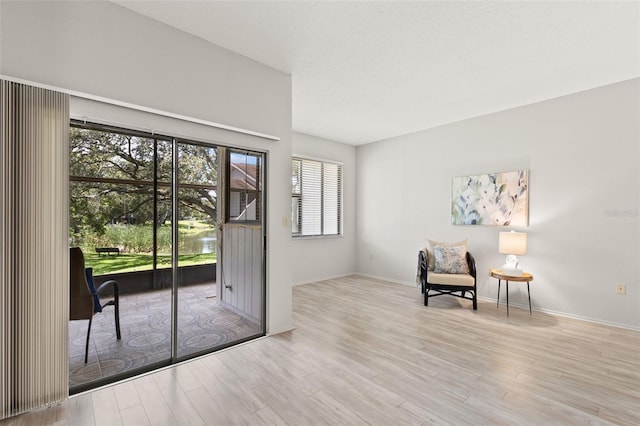 440 Lakeview Dr Unit 34, Palm Harbor, FL 34683 - living area featuring wood finished floors