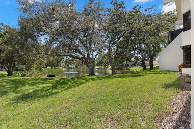 440 Lakeview Dr Unit 34, Palm Harbor, FL 34683 - view of grassy yard featuring a water view