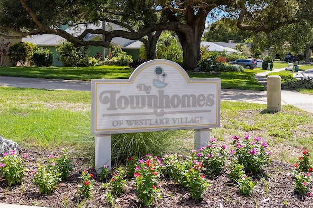 440 Lakeview Dr Unit 34, Palm Harbor, FL 34683 - community / neighborhood sign featuring a lawn