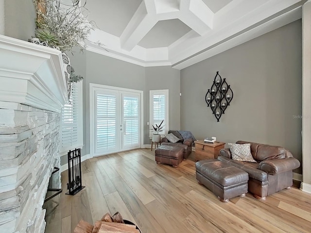 15024 Eaglepark Pl, Lithia, FL 33547 - living room with coffered ceiling, light wood-style flooring, beam ceiling, and a high ceiling