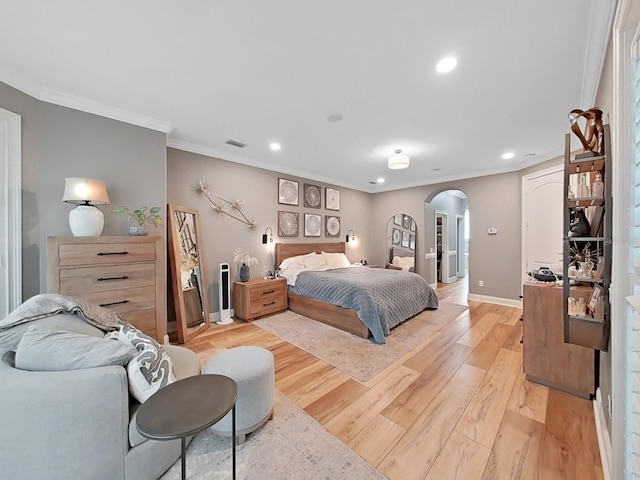 15024 Eaglepark Pl, Lithia, FL 33547 - bedroom with arched walkways, recessed lighting, light wood-style floors, and crown molding