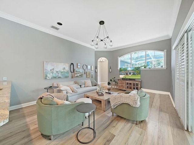15024 Eaglepark Pl, Lithia, FL 33547 - living room featuring arched walkways, wood finished floors, crown molding, and a chandelier